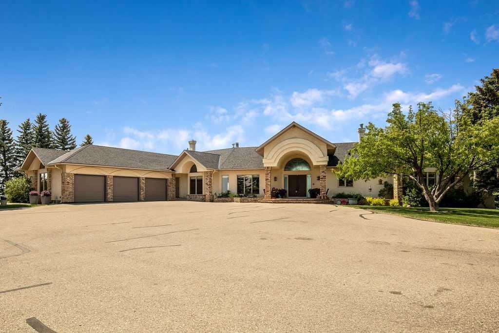 #100 182029 174 Avenue W, Priddis, Alberta, T1S 2B8