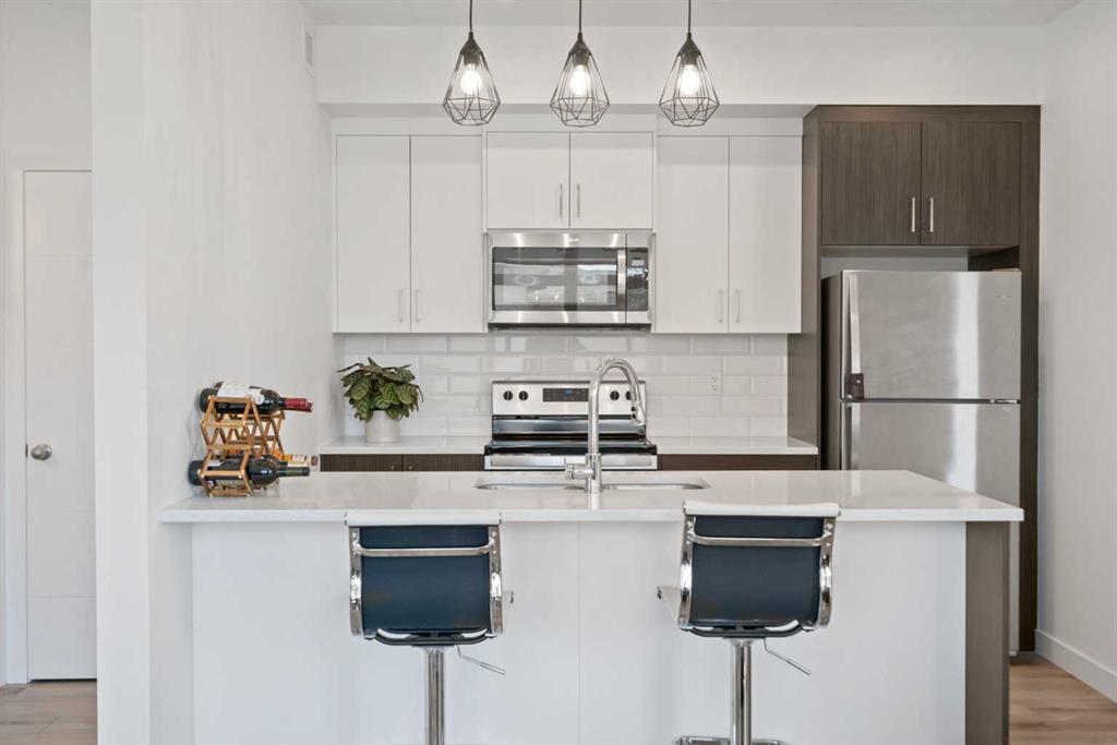 #217 205 Spring Creek Common SW, Calgary, Alberta, T3H 6E2