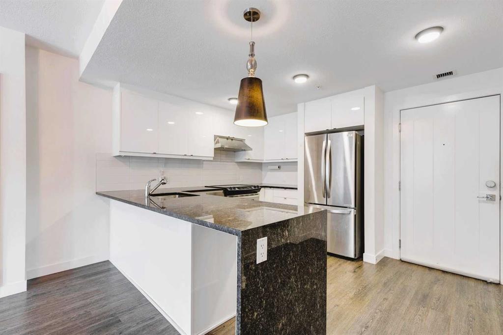 #103 25 Aspenmont Heights SW, Calgary, Alberta, T3H 0E4