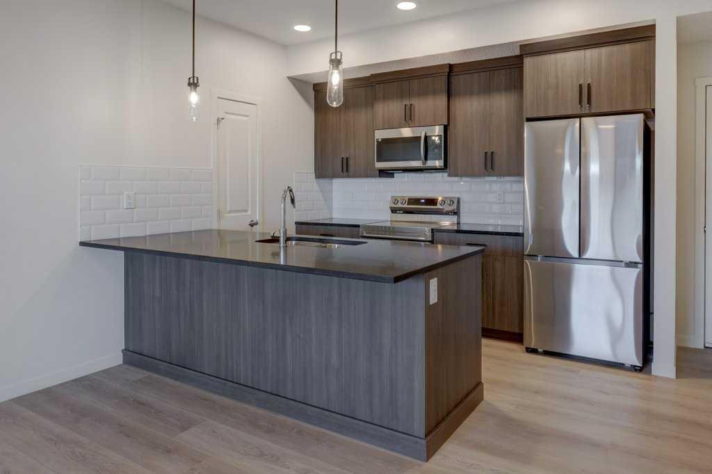 #211 245 Edith Place NW, Calgary, Alberta, T3R 2C9