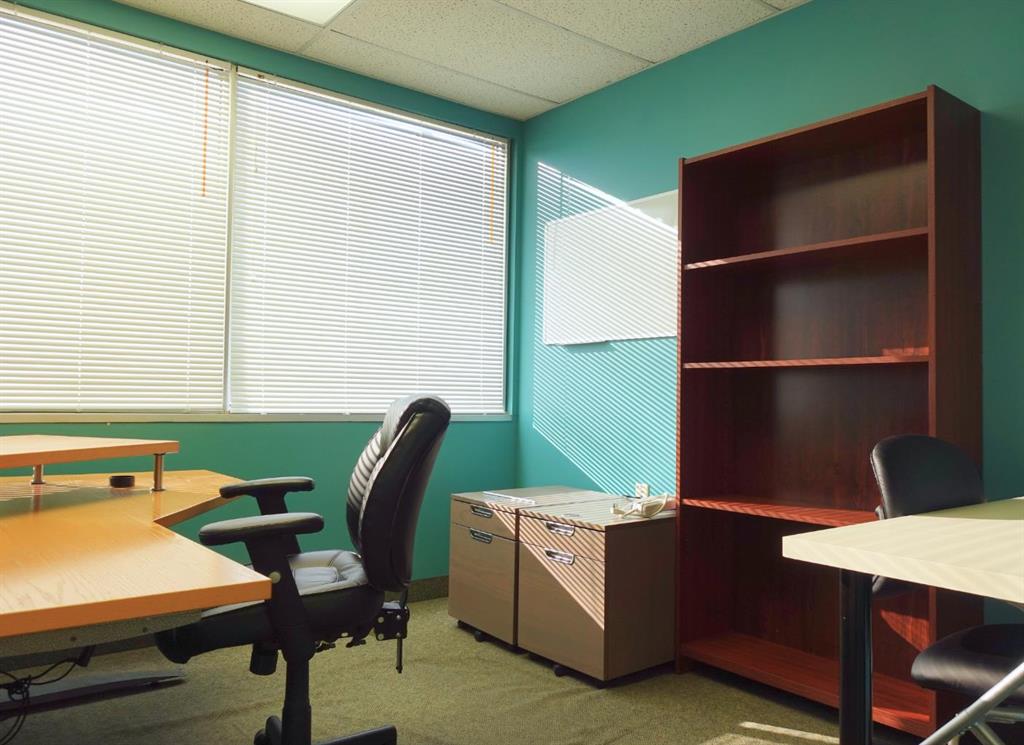 #203 1026 16 Avenue NW, Calgary, Alberta, T2M 0K6