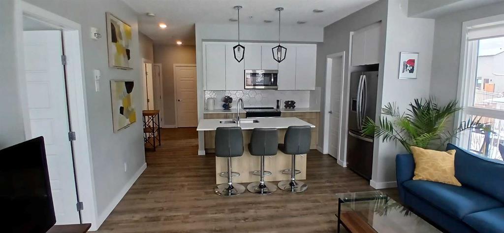 #102 1605 17 Street SE, Calgary, Alberta, T2G 2L7