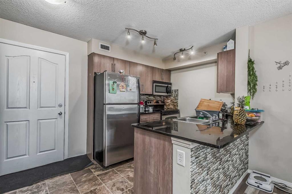 #408 7110 80 Avenue NE, Calgary, Alberta, T3J 0N4