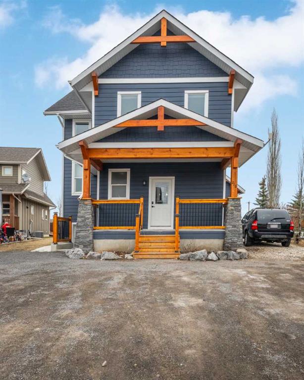 216 Cottageclub Crescent, Rural Rocky View County, Alberta, T4C1B1