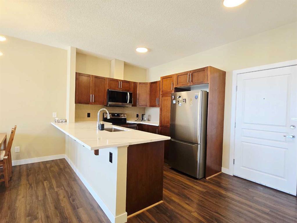 #301 76 Panatella Road NW, Calgary, Alberta, T3K 0V4