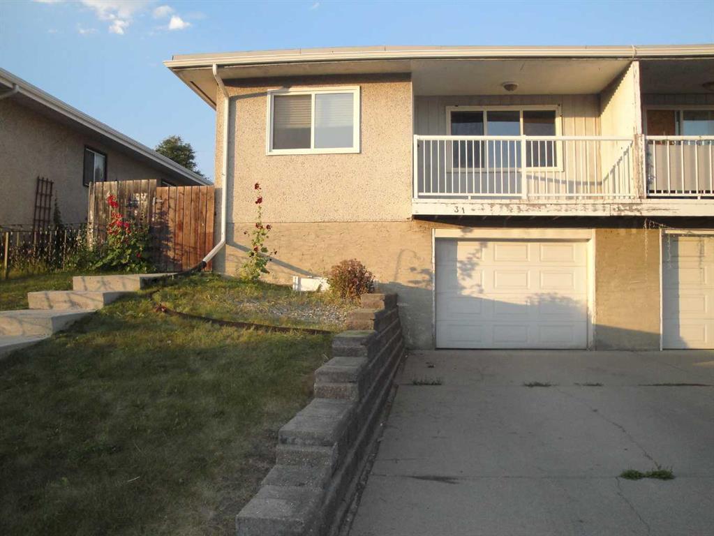 31 Huntford Road NE, Calgary, Alberta, T2K 3Y8